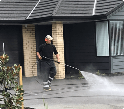 Waterblasting a residential driveway in Auckland
